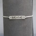 bracelet jade “yolo” médaillon inox